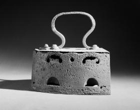 Holzkohlenbügeleisen