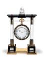 Grosse geheimnisvolle Portique-Uhr
Cartier Paris, 1923
Gold, Platin, Bergkristall, Koralle, O…