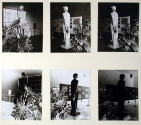 Vestibül vor dem Vortragssaal, mit Pflanzen, Ausstellung und Statue