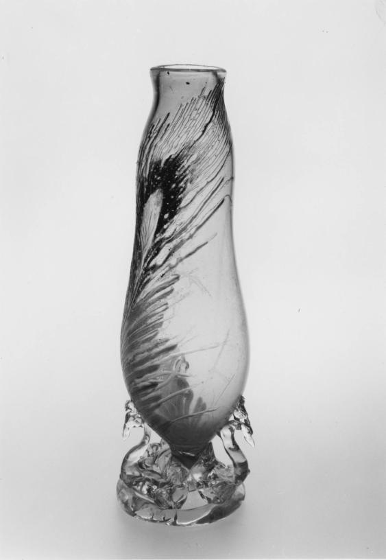 Vase mit Pfauenfeder