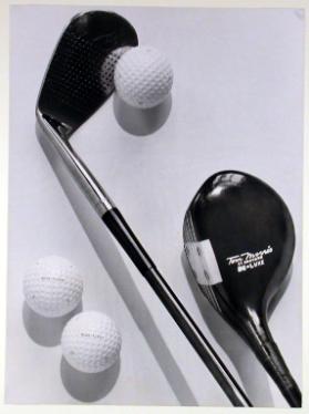 Golfschlägel und Bälle