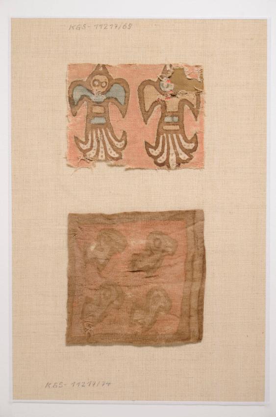 Gewebefragment mit zwei fliegenden Vögeln